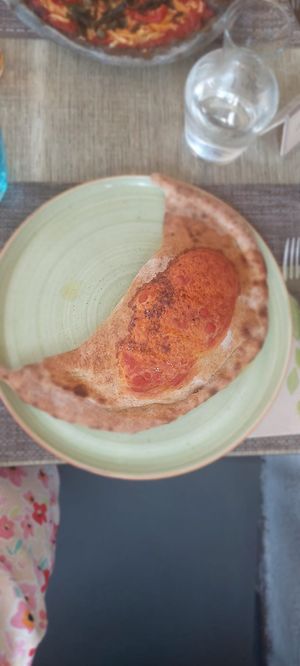 Calzone Stagione (Tomato, Vegan Mozzarella, Vegetables) at Pizzeria Controvento in Olginate