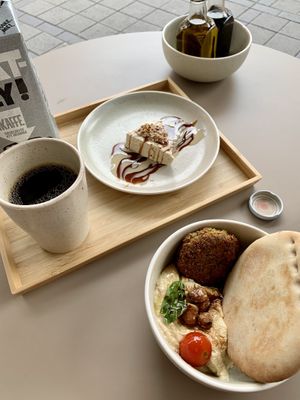 Falafel and dessert with coffee at Hummusson in Malmo