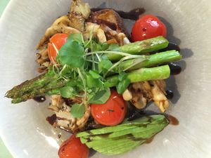 Vegan Toasted Pumpkin and seed bread with grilled asparagus, tomato confit, avocado, chilli jam and sautéed oyster mushrooms with balsamic glaze. Amazing!! at Mudjira Village Eatery in Mudgeeraba