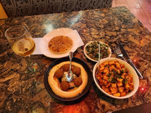Pita, falafel hummus, tabbouleh, spicy potatoes at Jerusalem in Myrtle Beach