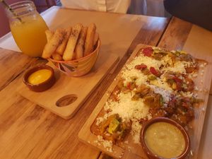 Fried yuca and vegan tostones at Tumatey in Barcelona