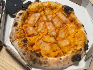 Bacon and cheddar pizza at Planet Vegan in Sao Paulo