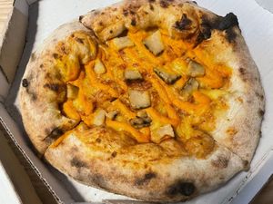 Three cheeses flavour pizza at Planet Vegan in Sao Paulo