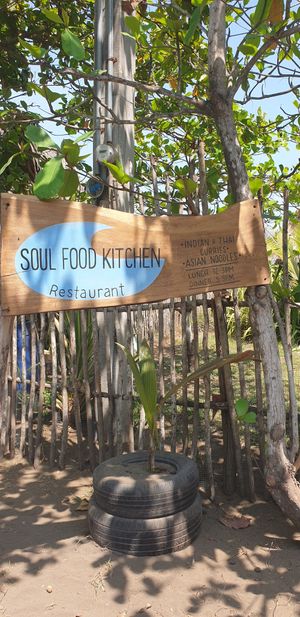 Sign at the street at Soulfood Kitchen in El Paredon