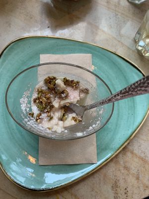 White pudding 🍮 with pomegranate & rose syrup, plus crispy pistachios. Delightful! Like a vegan panna cotta   at Beryl's  in Deventer