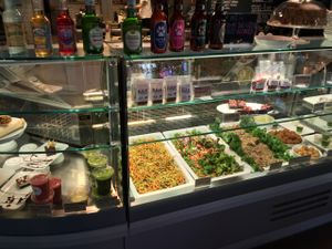 Behind the counter which is where you choose the options for their Fresh Plate.  at Funky Fresh Cafe - DogA in Oslo