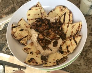 Hummus and pitta by the poolside at Albaca in Coronado