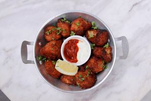 Vegan Cauliflower Wings served with vegan mayonnaise and dip at The Tiramisu Hero in Central Singapore