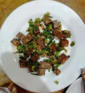 Vegan chhoila- Plant based vegan dry fried dish with cooked with green Chilly, green onion and organic spices at Pleased Veg & Vegan in Kathmandu