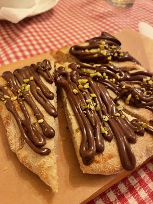 Pizza chocolate: literally pizza crust with chocolate on top, but it was good!  at Trevi's in Amsterdam