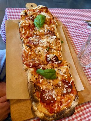 Pizza diabolo: tasty, with melted ‘cheese'  at Trevi's in Amsterdam