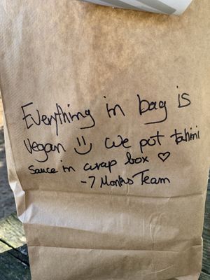 I ordered to go and asked to confirm is all I ordered was vegan. I received this bag ❤️. Attentive staff. Loved it   at 7 Monk's Cafe in New Braunfels