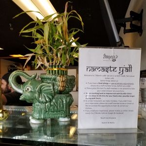 Welcome sign at 7 Monk's Cafe in New Braunfels