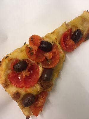 Focaccia with olives and tomato  at Nonsolopizza in Cremona