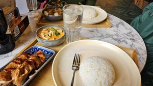 Two medium combo plates at Vegan Bamboo Bar at Market 27 in Amsterdam