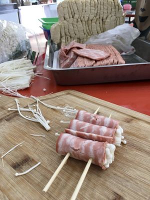 Staff preparing faux meat skewers for BBQ in the evening  at Míng Xiāng Yuán 名湘園蔬食燒烤 in Tainan