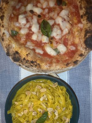 Vegan Margarita Pizza + Tagliatelle with Pumpkin sauce   at Dolce Amore in San Juan Siquijor