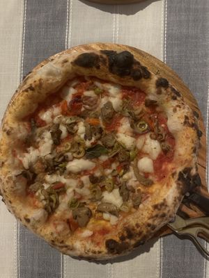 Pizza Vegana with vegan mozzarella & mushrooms, onions, garlic, olives   at Dolce Amore in San Juan Siquijor