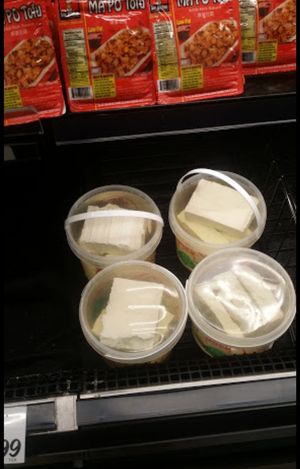 Bucket of tofu at HMart in Frederick