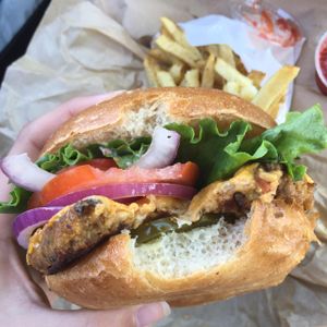 tempeh 'cheese' burgerwith hot fries and homemade ketchup  at Evolution Fast Food in San Diego