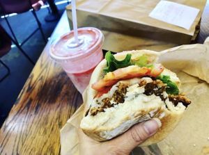 Mushroom burger with the Swiss cheese and a strawberry shake. What a perfect meal! 😋 at Evolution Fast Food in San Diego