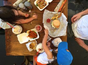 this NYC vegan family living this patio vibe and epic San Diego food!  at Evolution Fast Food in San Diego