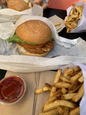 Pesto “chicken” burger n fries  at Evolution Fast Food in San Diego