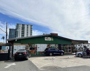 The left side of the restaurant looks like the building is ready for demolition 😯  at Evolution Fast Food in San Diego