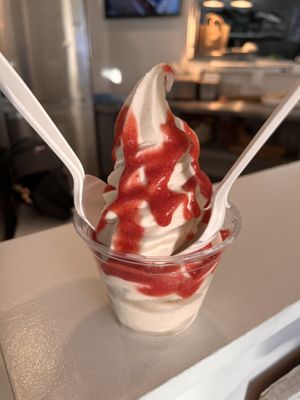 Vanilla soft serve with strawberry sauce   at Evolution Fast Food in San Diego