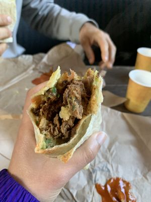 Very good California burrito. Service took a long time though  at Evolution Fast Food in San Diego