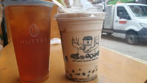 Peach Oolong and Boba Milk Tea with cream at NUTTEA - Soho in London