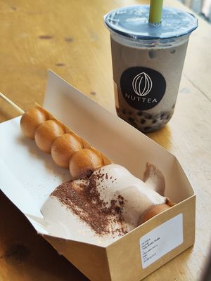 Black sesame boba tea & waffle with chocolate nut cream at NUTTEA - Soho in London