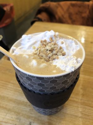 Nut milk latte with nut cream in my reusable cup 😋  at NUTTEA - Soho in London