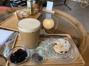 Iced latte with oat milk and vegan scone   at Postbar in Bruges