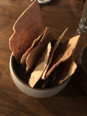 Also first course aperitif snack: homemade tortillas with a home made ‘cheese’ made of white beans.  at Kale & de Bril in Goes