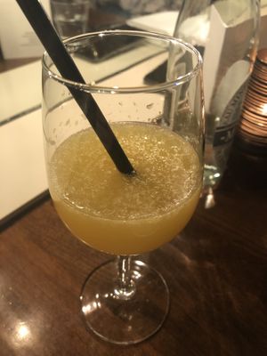 Second course drink: orange juice, ginger and an herbal distillate without alcohol at Kale & de Bril in Goes