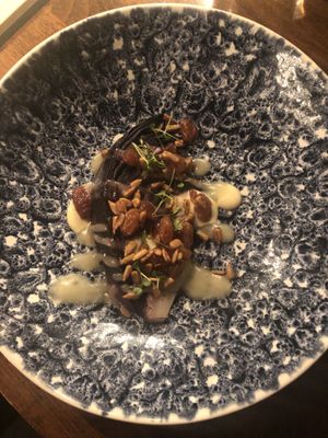 Third course: grilled red cabbage with veganaise, sunflower seeds, raisins inlaid in ginger and orange and arugula cress. at Kale & de Bril in Goes