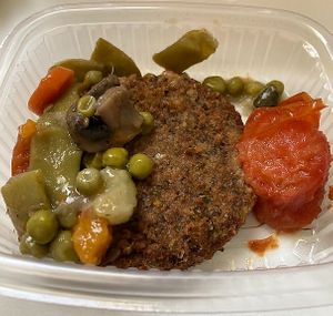 Vegan burger with veggies at El Templo Vegano in Madrid