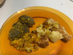 Fish, Coucous, tortilla, and Croquetas at El Templo Vegano in Madrid