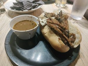 Seitan mushroom hoagie with dipping sauce at The Wild Cow in Nashville