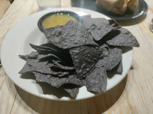 Corn chips and green salsa at The Wild Cow in Nashville