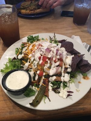 Amazing, to die for taco salad! I added peppers and seitan  at The Wild Cow in Nashville