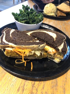 Ruben! Love the tanginess of the sauerkraut mixed with the sweetness of the grated carrots. Kale could’ve been braised/ steamed for a few minutes longer as it was chewy. at The Wild Cow in Nashville
