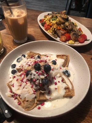 Ice coffee, queen waffle, and scrambled tofu toast at Flavour Bastards in Copenhagen