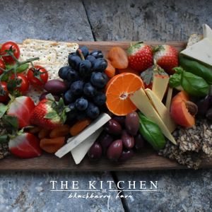 Vegan Grazing Board with vegan cheese, fruit and crackers  at The Kitchen at Blackberry Farm in Glastonbury