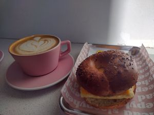 Sausage, egg, and cheese on everything bagel with salted caramel latte at Sleepyhead Coffee in Chattanooga