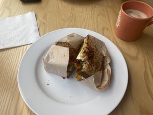 Breakfast sandwich with soy latte and Mac nut milk  at Olena Cafe in Honolulu