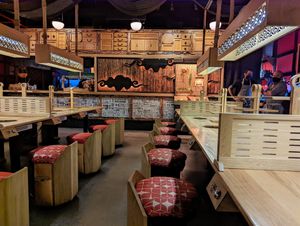 Chairs are bolted to the floor but swivel and hide a storage bin.  No outdoor dining. at dipdipdip Tatsu-Ya in Austin