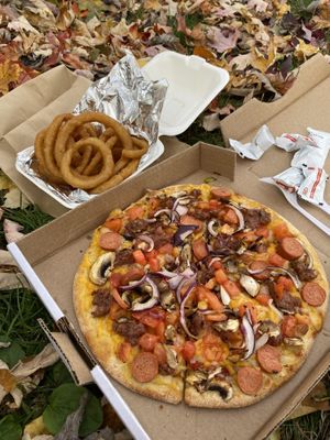 Pizza and onion rings   at Atlas Pizza in Montreal