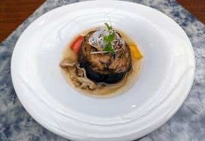 Aubergine with ganmo (fried tofu fritter made with vegetables) and savoury ankake sauce  at Ryokan Ayunosato in Hitoyoshi